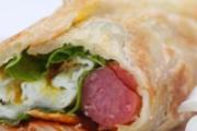 手抓饼的配菜都有哪些 手抓饼里的土豆丝是炒的还是煮的